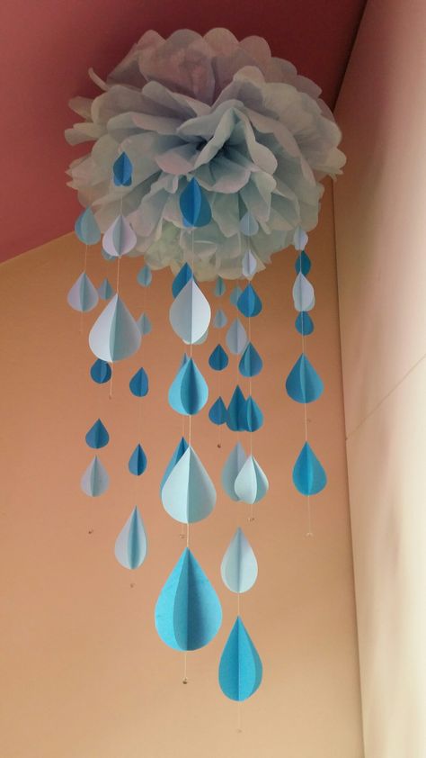 Paper rain mobile #paperart #papercloud #paperpompom #rain #blue Rain Cloud Mobile, Rain Classroom Decorations, Rain Theme Decoration, Rain Drop Craft, Raindrop Decorations, Vbs Magnified, Rain Decor, Raindrop Art, Notice Board Decoration