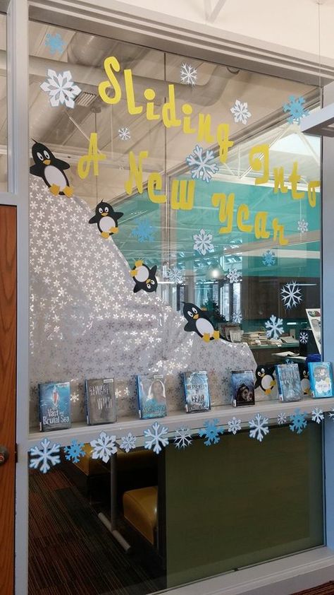 Sliding Into a New Year Book Display January Display Ideas, New Year Window Display Ideas, January Book Display, New Years Library Display, New Years Window Display, Library Window Displays School, Winter Window Display Classroom, New Year Library Display, Display Case Ideas For School