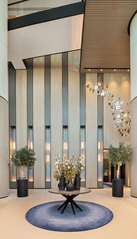 Lulie Fisher's design for new Vida hotel in Dubai features timber columns and pastel furniture - Projects, Hotel Design, Lulie Fisher Design Studio, Vida Hotel, Dubai - CID Pastel Furniture, Hotel Foyer, Tattoo Modern, Lobby Interior Design, Hotel Entrance, Column Design, Lobby Interior, Foyer Design, Hotel Interior Design