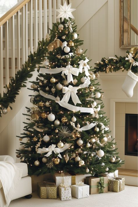 If you love that touch of luxury, a white Christmas tree with gold accents might be your perfect match. Imagine the soft glow of gold against clean white tones—it’s pure elegance! How would a glamorous white and gold tree look in your home this season? Add a bit of sparkle and warmth for a truly festive holiday vibe. Gold And White Xmas Tree, White And Green Christmas Tree Ideas, Green Christmas Tree Decorations Ideas, White And Gold Tree Christmas, Christmas Tree Ideas Gold And White, White Green Gold Christmas Decor, Christmas Tree Ideas White And Gold, White Christmas Tree Color Schemes, White Silver And Gold Christmas Tree