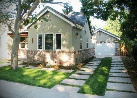 It might be outdated, but I want a ribbon driveway with grass breaks similar to this one.  Add this to the wildflower garden front yard look and you have a cute storybook cottage look. Extend Driveway With Pavers, Pavers To Extend Driveway, Driveway Patio Combo, Extending Driveway Ideas, Ribbon Driveway, Dirt Driveway, House Driveway, Modern Landscape Design Front Yard, Grass Driveway