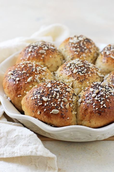 Soft and fluffy, these dreamy homemade multigrain rolls are impossible to resist! Hearty yet pillowy, they’re filled with oat bran, flaxseed, oats and whole wheat flour. And are a perfect compliment to any meal. Freezer friendly with dairy free option included. Multigrain Rolls, Honey Yeast Rolls, Dinner Roll Recipe, Oat Bran, Dinner Roll, Dinner Rolls Recipe, Roll Recipe, Dairy Free Options, Multigrain