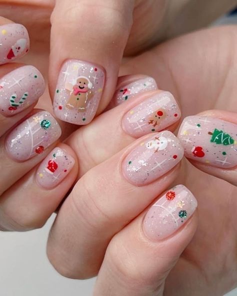 simple Korean Christmas nails: tiny Christmas symbols and shimmer Korean Xmas Nails, Christmas Nails Minimal, Christmas Korean Nails, Korean Christmas Nails, Simple Christmas Nails, Korean Christmas, Nail Noel, Xmas Nail Art, Cute Pink Nails