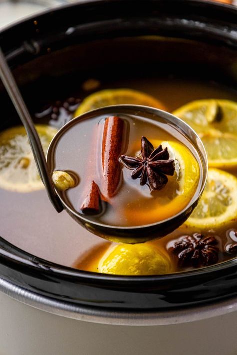 a ladle with cider, cinnamon sticks, star of anise, and cardamom pods Best Wassail Recipe, Cranberry Moonshine, Wassail Recipe Crockpot, Mulled Cider Recipe, Slow Cooker Apple Cider, Andes Mint Cookies, Wassail Recipe, Moonshine Recipe, Christmas Menu Ideas