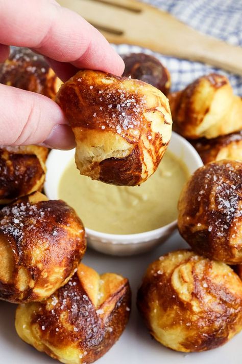 Make air fryer pretzel bites from canned biscuits! These easy pretzel bites are perfect for dipping in hot mustard sauce and enjoying for your next game day party. They are also a great snack since they are so easy to make. Enjoy warm and salty pretzels at home. At Home Pretzel Bites, Air Fryer Pretzel Bites Biscuit Dough, Pretzel Bites From Biscuits, Biscuit Pretzel Bites, Air Fryer Pretzel Bites, Air Fryer Pretzel, Appetizer Foods, Salty Pretzels, Upstate Ramblings