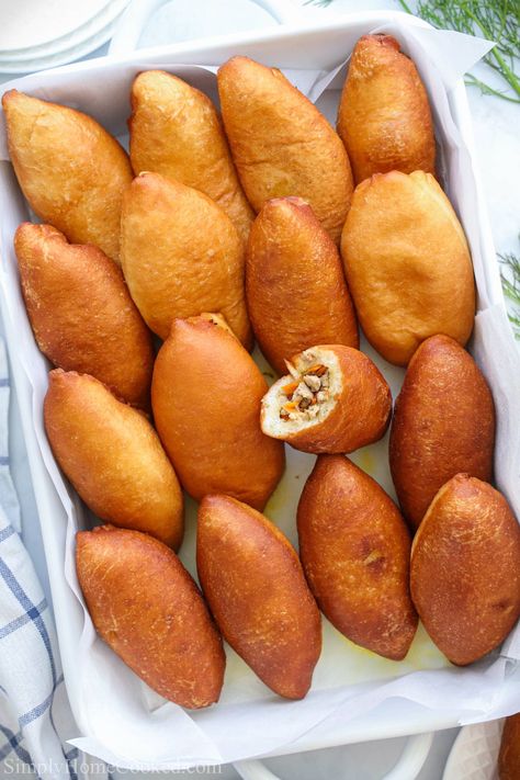 This Easy Piroshki Recipe takes your tastebuds back to the roots of Ukrainian and Russian food culture. Make this easy to create recipe today to share new flavors with friends and family. #piroshki #piroshkis #piroshkies #piroshkirecipe Pirozhki Recipe, Piroshky Recipe, Piroshki Recipe, Russia Food, Russian Dishes, Eastern European Recipes, Russian Food, Simply Home, Ukrainian Recipes