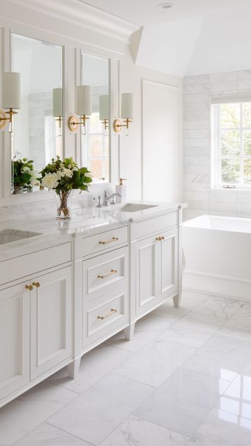 Primary Bath Cabinets, Bathroom Vanity Mirror With Sconces, White Master Bath Vanity, Cream Master Bath Ideas, Low Country Bathroom, Grandmillenial Master Bath, Coastal Traditional Bathroom, Elegant Primary Bathroom, Coastal Glam Bathroom