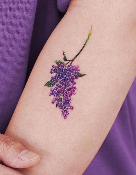 Lilac Tattoo Meanings - A Complete Guide Lilac Watercolor Tattoo, Lilac Plant Tattoo, Lilac Stem Tattoo, Rose And Lilac Tattoo, Lilac Tattoo Ideas, Tiny Lilac Tattoo, Tattoo Lilac Flower, Lilac Hand Tattoo, Lilac Tattoo Color