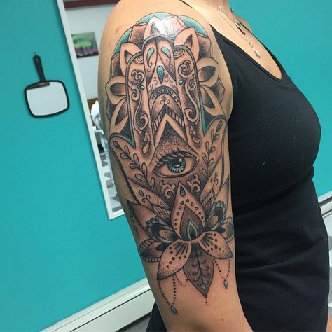 Black and turquoise colors are well-combined together as we see in this example. A realistic eye and lotus complete brilliantly hamsa halfsleeve girl`s tattoo. Hamsa Tattoo Design, Hamsa Hand Tattoo, Faith Tattoo On Wrist, Roman Numeral Tattoos, Hamsa Tattoo, Full Sleeve Tattoo Design, Wild Tattoo, Egyptian Tattoo, Full Sleeve Tattoos