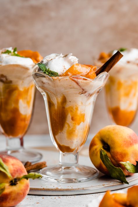 These Peach Milkshakes are full of the flavor of summer! A quick homemade peach pie filling is blended into vanilla bean ice cream along with milk, cinnamon, and a splash of vanilla. This is the most flavorful Peach Shake you'll ever taste! #peachshake #peachmilkshakes #milkshake #summerdessert #nobakedessert #summerrecipes #glutenfreedessert #bluebowlrecipes | bluebowlrecipes.com Homemade Peach Pie Filling, Peach Shake, Homemade Peach Pie, Stephanie Simmons, Vegan Peach Cobbler, Peach Milkshake, Peach Sauce, Peach Pie Filling, Bean Ice Cream