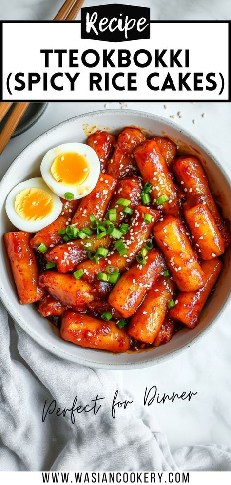 A bowl of Tteokbokki, Korean spicy rice cakes coated in a rich red chili sauce, garnished with sesame seeds and green onions, served with soft-boiled eggs for a flavorful and vibrant dish. Korean Tteokbokki Recipe, Tteokbokki Recipe Easy, Korean Tteokbokki, Healthy Korean Recipes, Korean Rice Cakes, Tteokbokki Recipe, Easy Korean Recipes, Korean Rice Cake, Rice Cake Recipes