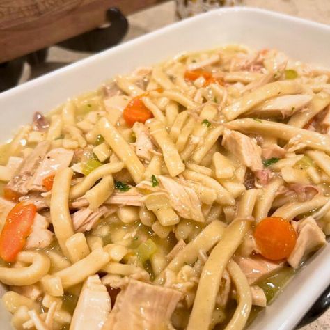 A spin on chicken and noodles, this old fashioned turkey and noodles recipe is a hearty and comforting classic just like grandma used to make. Thanksgiving Chicken Noodles Recipe, Chicken And Frozen Egg Noodles, Turkey And Reames Noodles Recipe, Turkey Egg Noodle Soup, Turkey Noodles Crockpot, Turkey Noodles Over Mashed Potatoes, Thanksgiving Egg Noodles, Turkey Noodle Soup With Reames Noodles, Leftover Turkey Noodle Soup Crockpot