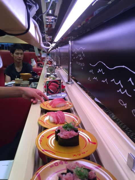 Conveyor Belt Sushi Restaurant  Fukuoka, Japan Sushi Belt Restaurant, Conveyor Belt Sushi Japan, Food Conveyor Belt, Sushi Conveyor Belt Restaurant, Sushi Train Aesthetic, Conveyer Belt Sushi, Japan Restaurant Aesthetic, Japan Food Aethstetic, Sushi Aesthetic Restaurant