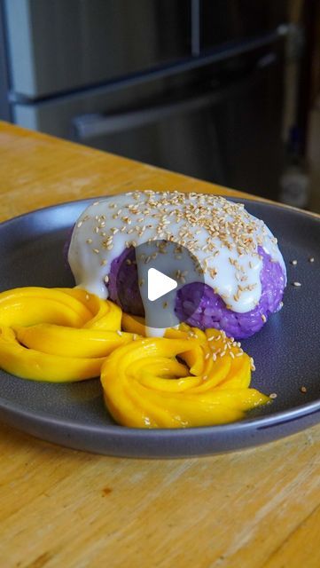 Andy on Instagram: "hey, i’m missing a utensil here🍴, do you know where I could find a little spoon?

my bestie @miarreal gifted me ube extract from @oaklandteaco so you know we had to try it out in our sticky situationship💜

Mango Ube Sticky Rice
Ingredients:
1 1/2 cup glutinous/sweet rice
13.5 oz can of coconut milk
1/2 cup sugar
pinches of salt 
1 1/2 tsp ube extract
1 tbsp tapioca starch
1-2 ripe mangos
toasted sesame seeds 

1. clean/rinse your rice. cook your sweet rice in a rice cooker. (for water content reference, fill til 1/4 of your finger tip of extra water over the rice)
2. in a medium sauce pan mix coconut milk, sugar, & a pinch of salt together. heat on med-high while stirring til it begins to simmer then remove from heat. pour half of your coconut milk mixture into a smal Rice Ingredients, Sticky Rice, Pinch Of Salt, Toasted Sesame Seeds, Filipino Recipes, Sesame Seeds, Coconut Milk, Mango, Toast