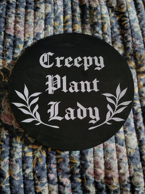 "Creepy Plant Lady Wall Decor. Handpainted with Vinyl.  Item is 10\"x10\". Choice of colors for vinyl. If the color you would like is not listed, please message me and I will do a custom color if available. The perfect addition to your horror decor! *Please note that there are plastic stands available for your item if you would like to put them on a shelf rather than hanging them. Please select \"with stand\" in the options if you would like one to be included with your order." Witchy Wall Art Prints, Creepy Cute Decor, Boho Goth Decor, Goth Farmhouse, Gothic Farmhouse Decor, Horror Home Decor, Creepy Home Decor, Punk Decor, Horror Crafts