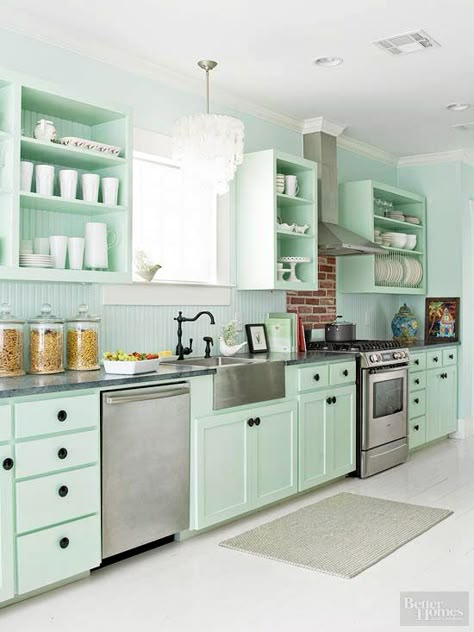 Add a personal element to your kitchen by painting cabinetry. Mint Green Kitchen, Mint Kitchen, Green Kitchen Designs, Desain Pantry, Cottage Style Kitchen, Green Kitchen Cabinets, Casa Vintage, Green Cabinets, Cottage Kitchen