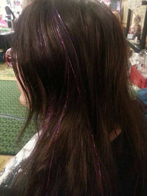 Purple in Brown Brown Hair With Glitter Strands, Purple Tinsel In Brown Hair, Purple Hair Tinsel Brunette, Purple Tinsel Hair, Pink Tinsel In Brown Hair, Brown Hair Tinsel, Dark Brown Hair With Tinsel, Long Stringy Hair, Purple Hair Tinsel