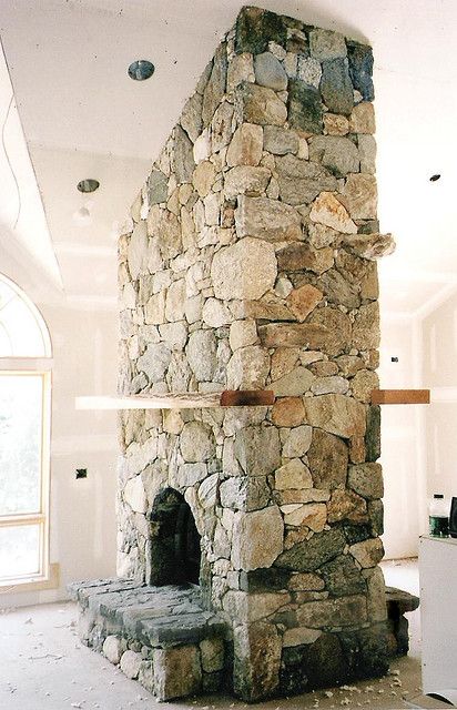 Double-sided stone fireplace - I want to find a house with one of these, would be perfect if the other side was in the kitchen. Two Sided Fireplace, Fireplace Designs, Small Fireplace, Double Sided Fireplace, Concrete Fireplace, Rock Fireplaces, Ski House, Fireplace Remodel, Diy Fireplace