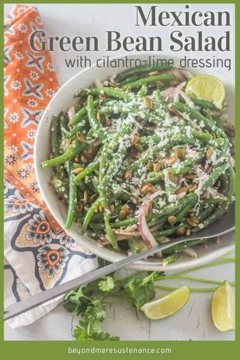 It's summer, and the same old green salad doesn't sound appealing? Try this Mexican Green Bean Salad with fresh tender crisp green beans, red onion, and cotija, dressed up with a simple cilantro lime dressing and toasted pepitas. It's a perfect side with a definite Latin vibe! #Mexicangreenbeans #greenbeansaladrecipe #healthyMexican #Mexicansides #quickhealthysides #glutenfreesides #vegetariansides Mexican Green Beans Recipe, Mexican Green Beans, Green Bean Salad Recipes, Green Beans Side, Green Beans Side Dish, Green Bean Salad, Cilantro Lime Dressing, Green Bean Salads, Quick Dishes