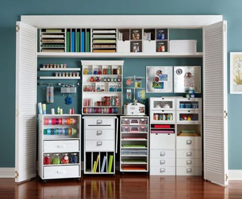 12 Creative Craft Closets {amazing ideas} - EverythingEtsy.com....I like the storage on wheels for being able to bring out for a craft session Craft Room Closet, Storage Inspiration, Dream Craft Room, Craft Room Design, Organization Furniture, Scrapbook Room, Office Crafts, Craft Room Storage, Craft Room Office