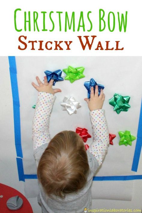 A Christmas bow sticky wall is the perfect activity for toddlers. Practice fine motor skills, colors, patterns, and keep them entertained! Toddler Christmas Craft, Christmas Activities For Toddlers, Sticky Wall, Infant Classroom, Activity For Toddlers, December Crafts, Christmas Craft Ideas, Christmas Crafts For Toddlers, Daycare Activities