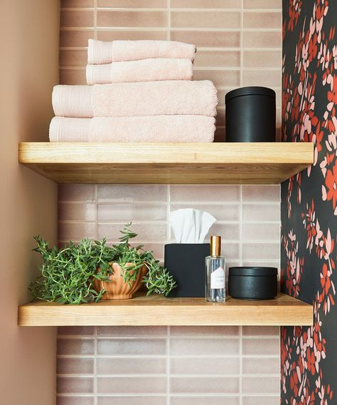 Keep away clutter and make your space more functional with our best ideas for decorating bathroom shelves with storage that's both hardworking and pretty as can be. Open Bathroom Shelves, Brick Floor Bathroom, Style A Bathroom, Decorating Bathroom Shelves, Trending Bathroom Colors, Green Tile Bathroom, Ceramic Tile Bathrooms, Open Bathroom, Eclectic Bathroom