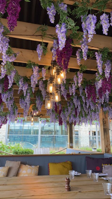 Floral Wall Restaurant, Faux Flower Ceiling, Flower Ceiling Restaurant, Ceiling Flower Design, Wisteria Decor, Simple Floral Decor, Apothecary Decor, Flower Ceiling, Rustic Cafe