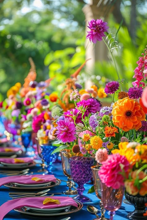 29 Garden Party Decor Ideas to Elevate Your Outdoor Celebrations 1 Garden Party Layout, Bright And Bold Wedding Colors, Different Color Tablecloths Wedding, Bright Garden Party, Colorful Glassware Wedding, Colorful Wedding Tablescape, Modern Garden Party Wedding, Bright Party Decor, Birthday Garden Party Ideas