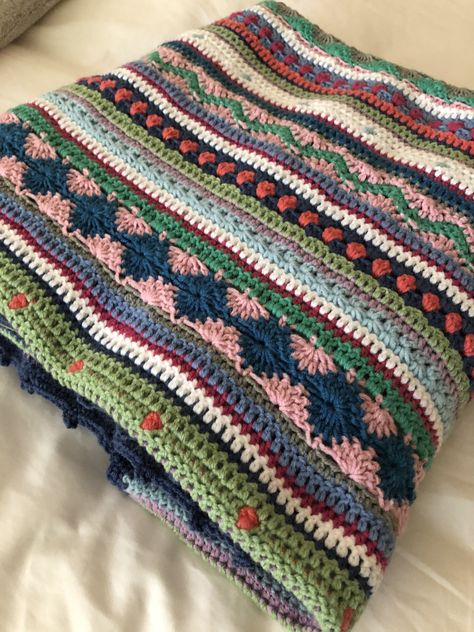 As We Go Stripey Blanket, Multicolored Crochet Blanket, Multi Stitch Crochet Blanket, Crochet Blanket One Color, Scrap Crochet Blanket, Crochet Blanket Color Schemes, Crochet Scrap Blanket, Scrap Yarn Blanket, Crochet Sampler Blanket