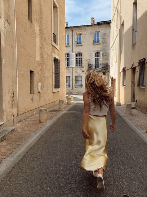 Yellow silk skirt white top blonde france europe Yellow Silk Aesthetic, Yellow Slip Skirt Outfit, Yellow Silk Skirt Outfit, Yellow Silk Skirt, Yellow Satin Skirt Outfit, High Neck Top Outfit, Yellow Satin Skirt, Silk Top Outfit, Western Closet