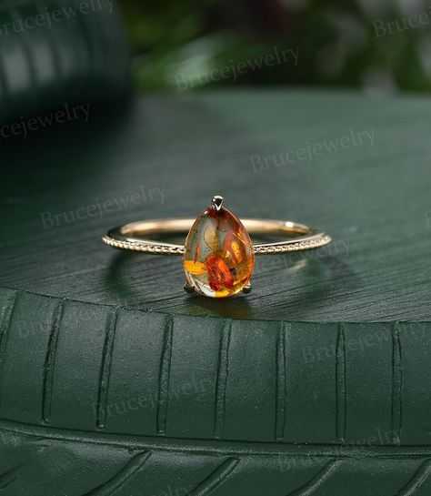 This Engagement Rings item by BrucejewelryStore has 1192 favorites from Etsy shoppers. Ships from Canada. Listed on 11 Feb, 2024 Orange Engagement Ring, Amber Engagement Ring, Somali Wedding, Yellow Gold Solitaire Engagement Ring, Anniversary Rings For Her, Gold Solitaire Engagement Ring, Yellow Gold Solitaire, Special Ring, Jewels Rings