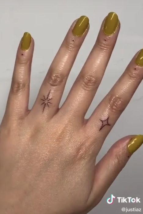 Finger Tattoos Sparkle, Starburst Finger Tattoo, Stick N Poke Finger Tattoos, Sparkle Finger Tattoo, Stick And Poke Tattoo Finger, Finger Stick And Poke Tattoo, Finger Stick And Poke, Simple Foot Tattoo, Tiny Stick And Poke Tattoos Simple