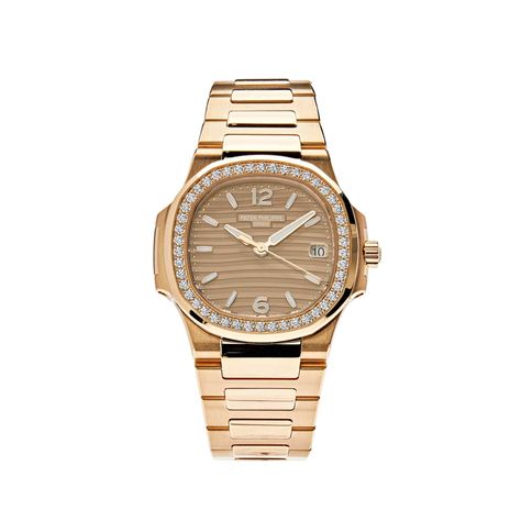 Luxury Watch Patek Philippe Ladies Nautilus Quartz Rose Gold Diamond Bezel 7010/1R-012 Wrist Aficionado Luxury Classic Diamond Watch With Date Display, Luxury Gold Jewelry And Watches With Round Dial, Golden Champagne, K Rose, Jules Verne, Gold Armband, Authentic Watches, Rose Gold Case, Patek Philippe Nautilus