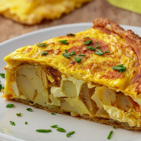 🌞✨ ¡Hola, amigos! ✨🌞This morning, I indulged in a classic Spanish dish: Tortilla Española! 🇪🇸❤️🥔 What makes it special? Ingredients: Just eggs, potatoes, and a touch of onion, cooked to perfection. Texture: Soft and fluffy on the inside with a golden crust outside. Versatility: Enjoy it hot or cold, as a hearty breakfast or a tasty tapas! Each bite is a slice of Spain! Have you tried making it at home? Share your experience! 👇✨#TortillaEspañola #SpanishBreakfast #FoodieDelight #TasteOfSpain Spanish Food Recipes, Tortilla Espanola, Spanish Dish, Spanish Breakfast, Egg Tortilla, Eggs Potatoes, Spanish Dishes, Spanish Food, Hearty Breakfast