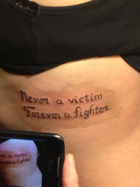 Dv Awareness Tattoo, Trama Childhood Tattoo, Domestic Survivor Tattoo Ideas, Never A Victim Forever A Fighter Tattoo, Tattoos For Domestic Abused Women, Domestic Vilonce Tattoos, Domestic Vilonce Survivor Tattoos, Dv Tattoos, Dv Survivor Tattoo