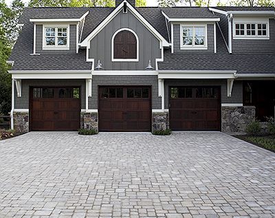 I like driveway stone. Space them out more and add some grass. I also like the stone on the house and the garage doors and paint colors Brown Garage Door, Grey Exterior House Colors, Paint Colors For House, Colors For House, Gray House Exterior, Best Exterior Paint, Gray House, Driveway Design, Garage Door Design