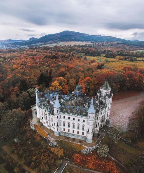 Dunrobin Castle, Sutherland, Scotland, has been home to the Earls and Dukes of Sutherland since the 13th century. In 1844 Sir Charles Barry drew up designs for the second Duke of Sutherland to enlarge and alter the original modest castle. Barry visited the site in 1848 when he designed the great tower and laid out the terraced garden. The very large extravagantly silhouetted building occupies a splendid position above Dornoch Firth. Dunrobin Castle, European Castles, Castles In Scotland, Scotland Castles, Royal Castles, Scottish Castles, Castle Ruins, Castle House, England And Scotland