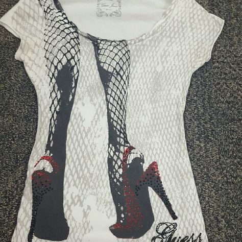 GUESS Phoebe Ruby Tee Fitted, Sexy, graphic GUESS t-shirt with rhinestones and braided, scoop neck line. Previously owned, great condition Guess Tops Tees - Short Sleeve Neck Line, Red White, Scoop Neck, Ruby, Tops & Tees, Customer Support, Jewelry Designer, Vintage Fashion Trends, Fast Delivery