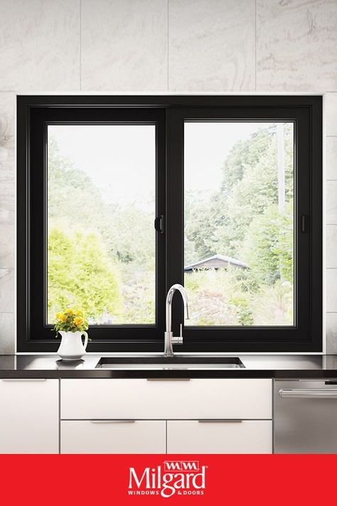 For a modern kitchen look try using black horizontal sliding windows. The frames are crisp and bright and the operating style allows both natural light and fresh air to come into the home. Featuring UltraTM Series windows by Milgard Windows & Doors. #kitchenwindowideas #kitchenideas #homedecorideas #modernkitchenideas Slider Windows, Sliding Window Design, Milgard Windows, Window Inspiration, Window Construction, Black Window Frames, Slider Window, Ideas Cocina, House Window Design