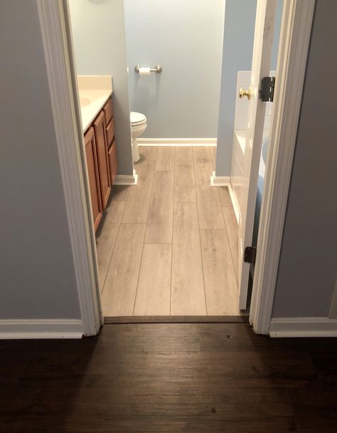 Laminate Wood Bathroom Floor, Wood Laminate In Bathroom, Wood Vinyl Bathroom Floor, Bathroom With Laminate Flooring, Hardwood To Vinyl Plank Transition, Lvt In Bathroom, Dark Wood Bathroom Floor, Lvp Bathroom Floor, Bathroom Flooring Ideas Vinyl