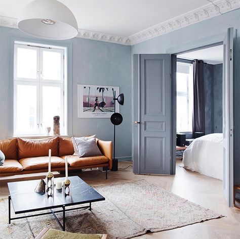 A Norwegian home tour: sitting room with light blue walls and cognac leather sofa. Photo Yvonne Wilhelmsen interior Tone Kroken Light Blue Living Room, Norwegian Home, Blue Walls Living Room, Studio Floor Lamp, Light Blue Walls, Sofa Set Designs, Beautiful Sofas, Blue Living Room, Blue Rooms