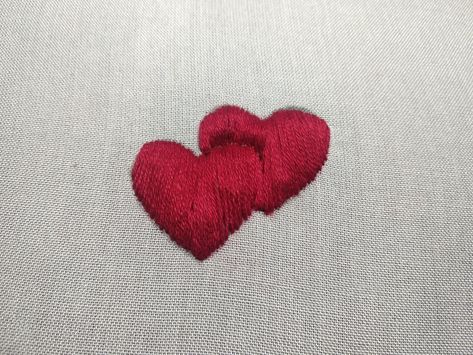 How to do padded satin stitch Padded Satin Stitch Embroidery, Heart Hand Embroidery, Embroidering Stitches, Hand Embroidery Heart, Heart Embroidery Designs, Bedding Design, Embroidery Heart, Anchor Threads, Embroidery Hearts