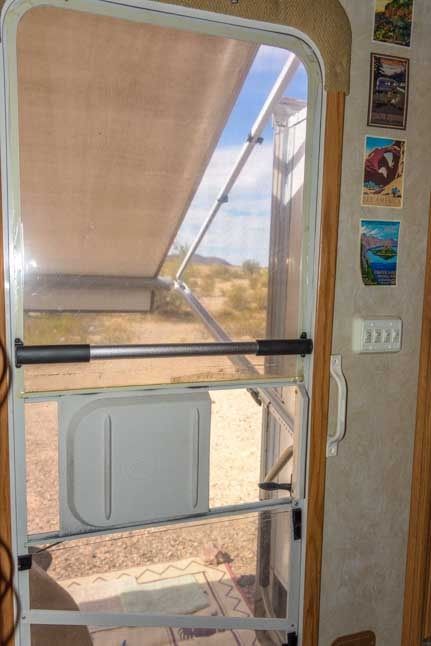 Who knew you could do so much to a silly screen door?? Rv Screen Door Makeover, Truck Hacks, Rv Security, Screen Door Handle, Rv Screen Door, Screen Door Handles, Screen Door Lock, Vintage Screen Doors, Rv Interior Design