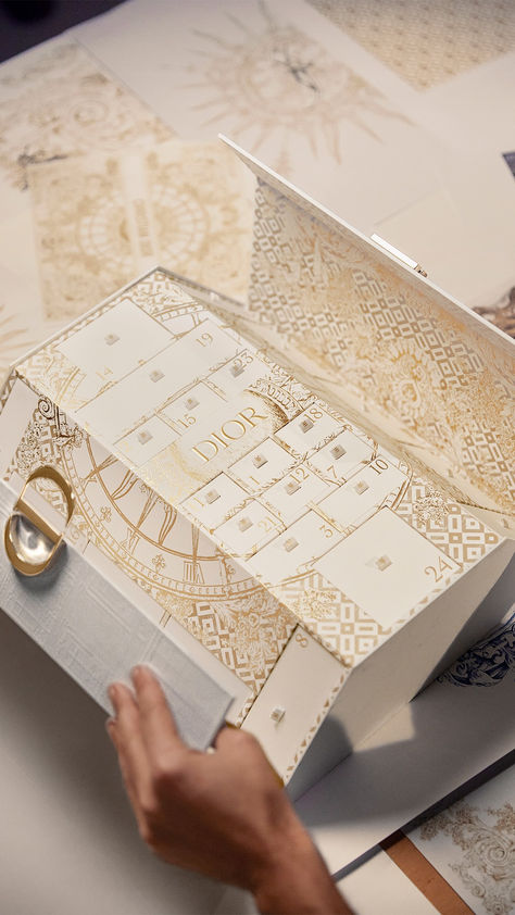 Discover the Dior  Le 30 Montaigne Advent Calendar. A limited-edition adorned with the golden motif designed by artist Pietro Ruffo, inspired by the treasures of the Château de Versailles. Behind each calendar window hides a surprise for 24 days of enchantment. #giftthediordream #diorholiday Dior Advent Calendar, Montaigne Dior, Beauty Advent, Dior Perfume, Beauty Advent Calendar, Makeup And Skincare, Dior Beauty, Calendar 2024, Motif Design