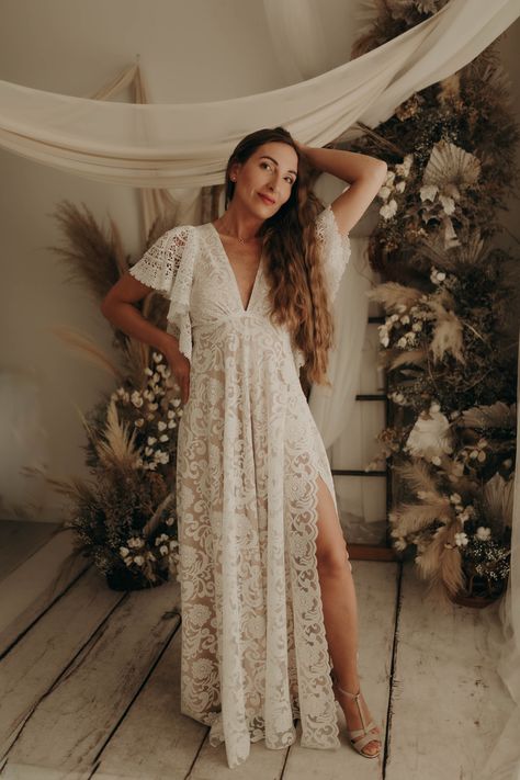 Modern bohemian wedding dress design. Perfect for boho style wedding ceremony, beach, garden, outdoor or indoor wedding. Amazing elopement or engagement dress. - It is hand made to your custom size.   Instruction how to take measurements will be sent to you after purchase     made. - This wedding dress is available in off white colour with tan lining. - V neck and open back with lace ties. - Amazing crochet wide sleeves. - Dress is fully lined with soft, tan lining fabric which highlights the gl Comfy Boho Wedding Dress, Simple Outdoor Wedding Dress Boho, Bohemian White Dress Long, Long Boho Wedding Dress, Winter Wedding Dress Boho, Small Forest Wedding Dress, Boho Bride Dress Bohemian, Cowgirl Boots And Wedding Dress, Forest Witch Wedding Dress