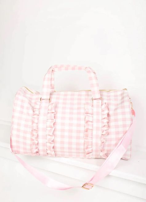 Gingham Ruffle Duffle Bag with Patches. Personalized. 0-2 patches included. An easy choice for a weekender bag, our Ruffle Duffle comfortably holds all of your getaway essentials--like packing cubes, a sweatshirt & Pouches--while still fitting under the seat of airplanes. Perfect to use as a gym bag, travel bag, overnight bag, baby bag, overnight bag for kids, daycare bag and more. Bag With Patches, Daycare Bag, Letter Patches, Kids Daycare, Holdall Bag, Outfits Petite, Sac Week End, Current Fashion, 2022 Trends