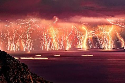 This incredible image was taken in Ikaria Island, Greece near the southwestern coast of Turkey. Photographer Chris Kotsiopoulos captured the stunning image when he set out to document the total lunar eclipse on June 15, 2011 Catatumbo Lightning, Lightning Storms, Forces Of Nature, Lightning Storm, Stormy Weather, Lightning Strikes, Power Of Nature, To Infinity And Beyond, Travel Nature