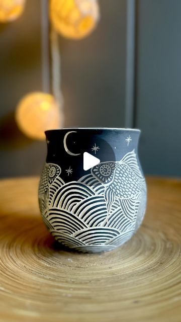 Ceramic Artist, Zahava Friedman on Instagram: "Many of my designs are derived from hundreds of hours doodling in school, which explains a lot about my knowledge of history and math 😆 “Fish dreams” Wheel thrown ceramic mug with freehand sgraffito. . . . #muglovers #wheelthrownmugs #sgraffitopottery #sgraffitoceramics #fishart #fishdesign #freehandart #amacovelvetunderglaze #carvedclay #handmadepottery #potterylovers #mugcollection #illustratedceramics #potterymug #ceramicmug #cerámicas #makers #clayarts #functionalart #shophandmade #ceramilicious" Scrafito Designs, Sgraffito Mug, Sgraffito Designs Easy, Sgraffito Fish, Mishima Ceramics, Sgraffito Designs, Sgraffito Pottery, Ceramic Crafts, Wheel Thrown Ceramics