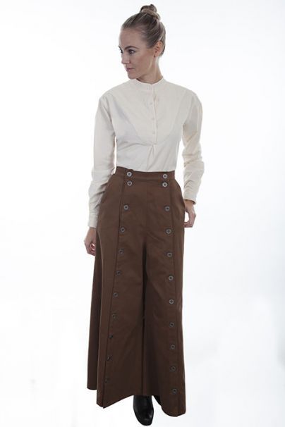 THIS IS A PREMIUM SPLIT RIDING SKIRT FOR EVERY WESTERN WOMAN. This authentic split riding skirt is made of a soft brushed twill cotton and has large pewter buttons down each side with open side entry pockets. Split Riding Skirt, Armor Jewelry, Riding Skirt, Costume Armour, Western Women, Reading Shirts, Historical Costume, Contemporary Outfits, Famous Brands