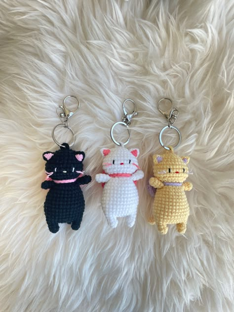 - A cute and cuddly kitten keychain or charm, perfect for any cat lover. Made with soft, durable acrylic yarn and measures approximately 3 inches tall. The keychain features a lobster clasp and the charm features a split.#crochetkeychain #handmadegifts #DIYkeychain #crochetlove #keychainaddict Cat Crochet Keychain, Crochet Tags, Business Crochet, Fluffy Crochet, Amigurumi Keychain, Unique Gifts For Friends, Keychain Designs, Crochet Keychains, Easy Crochet Animals